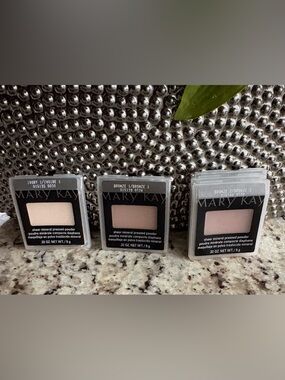 MK Sheer Mineral Pressed Powder $25 each